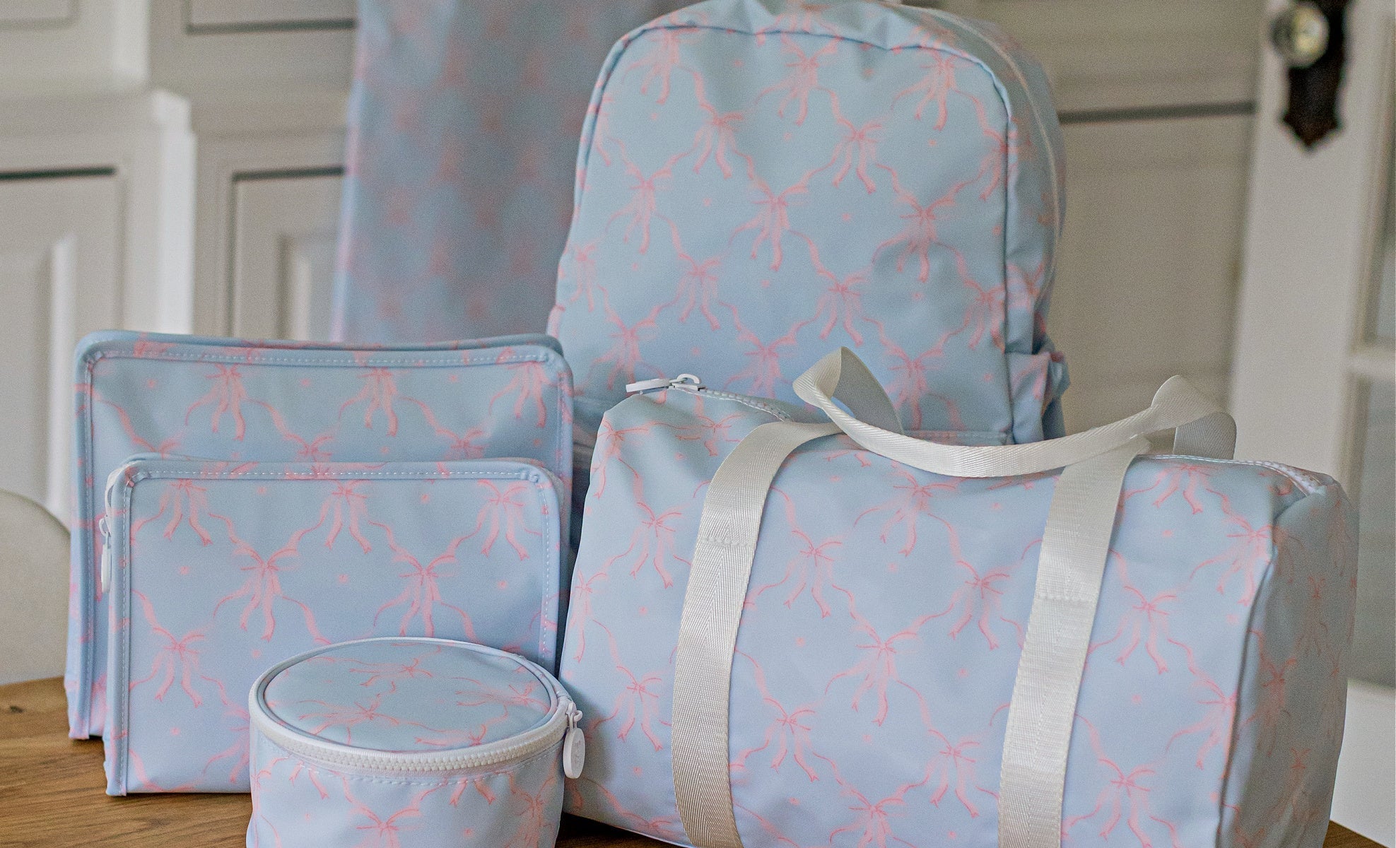 ELOISE BOW MINI BACKER